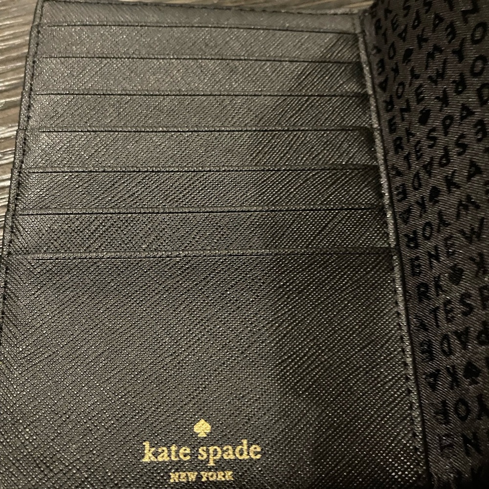 Kate Spade Pink/Blue/Black striped passport Holder
NWOT - Picture 3 of 6